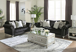  																			Harriotte Black Living Room Set - 2...
																		 