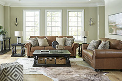  																			Carianna Caramel Living Room Set - ...
																		 